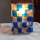 1970s designer table lamp with blue and clear plexiglass pendants.