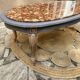 Oval coffee table in marble and wood