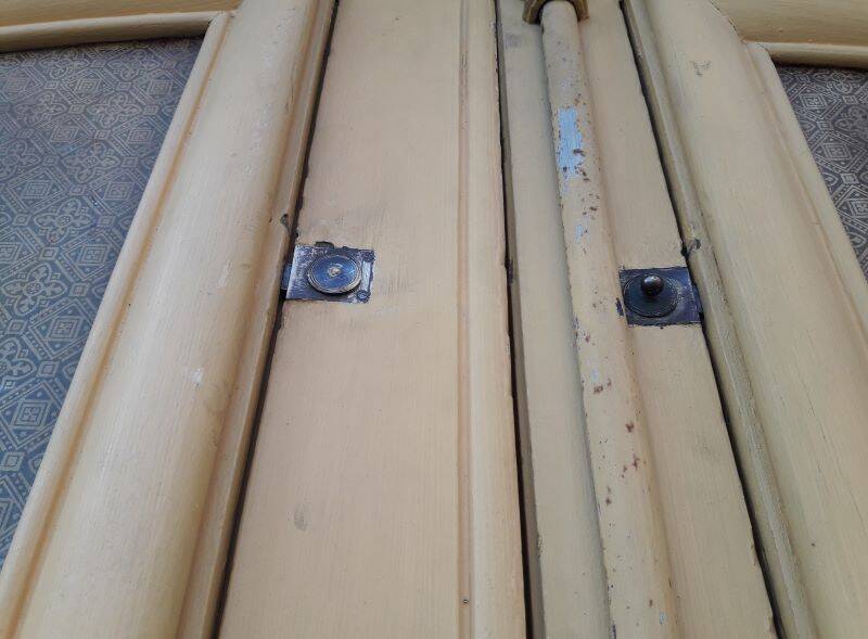 19th century double arched entrance door in oak with grilles and old glass