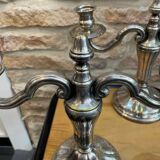 Pair of silver-plated metal candelabra