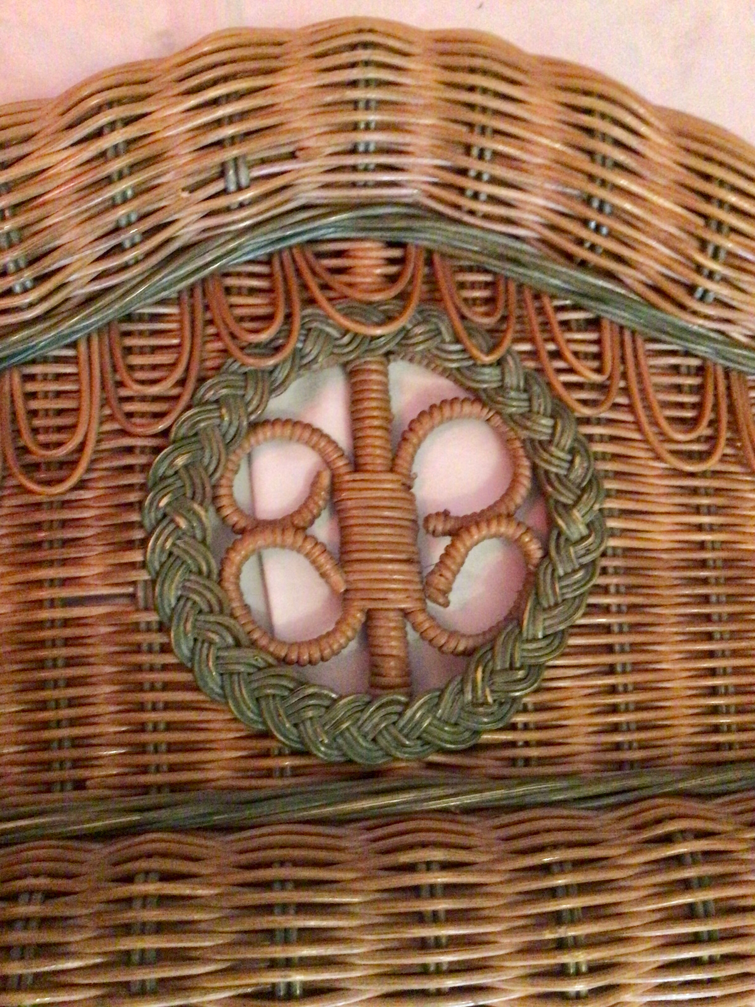 Vintage braided rattan mirror.