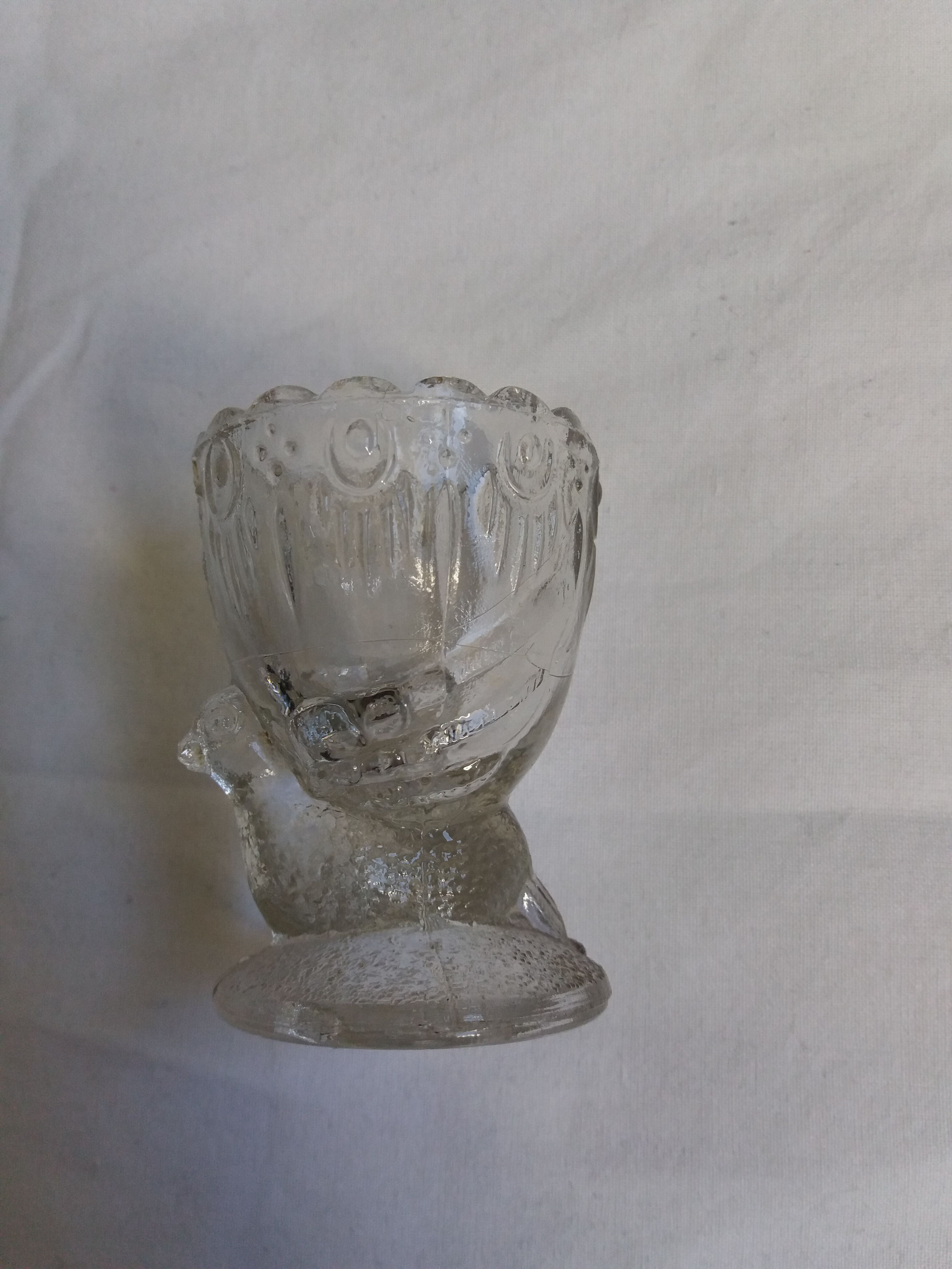 Molded glass egg cup with pigeon bird