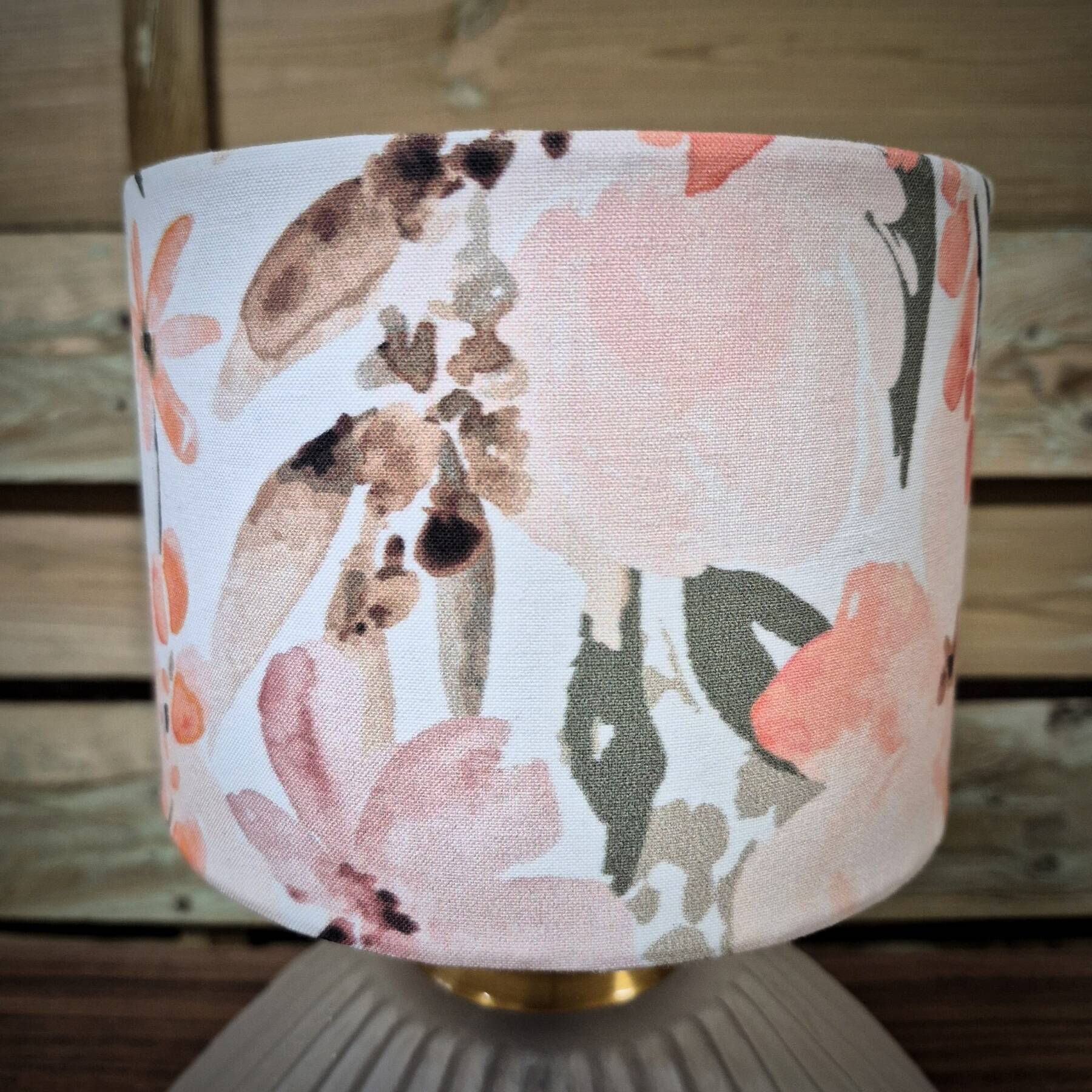 Table lamp, glass base and floral shade