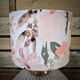 Table lamp, glass base and floral shade