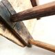 Old milking stool, old farm stool, primitive art.