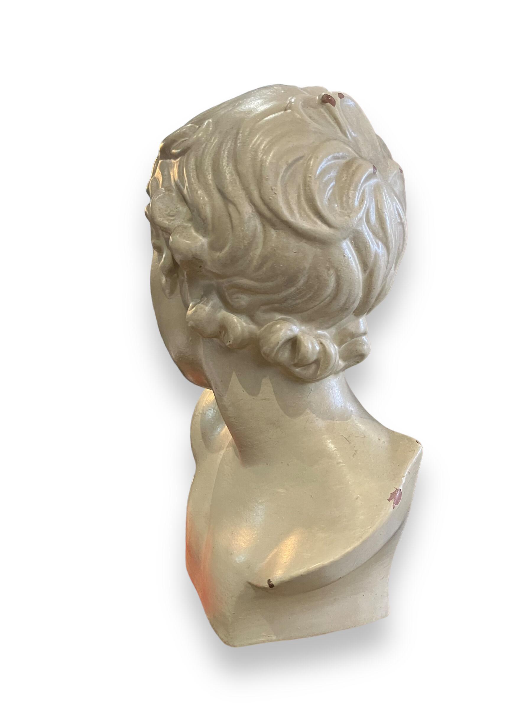 Bust of eros in glazed terracotta