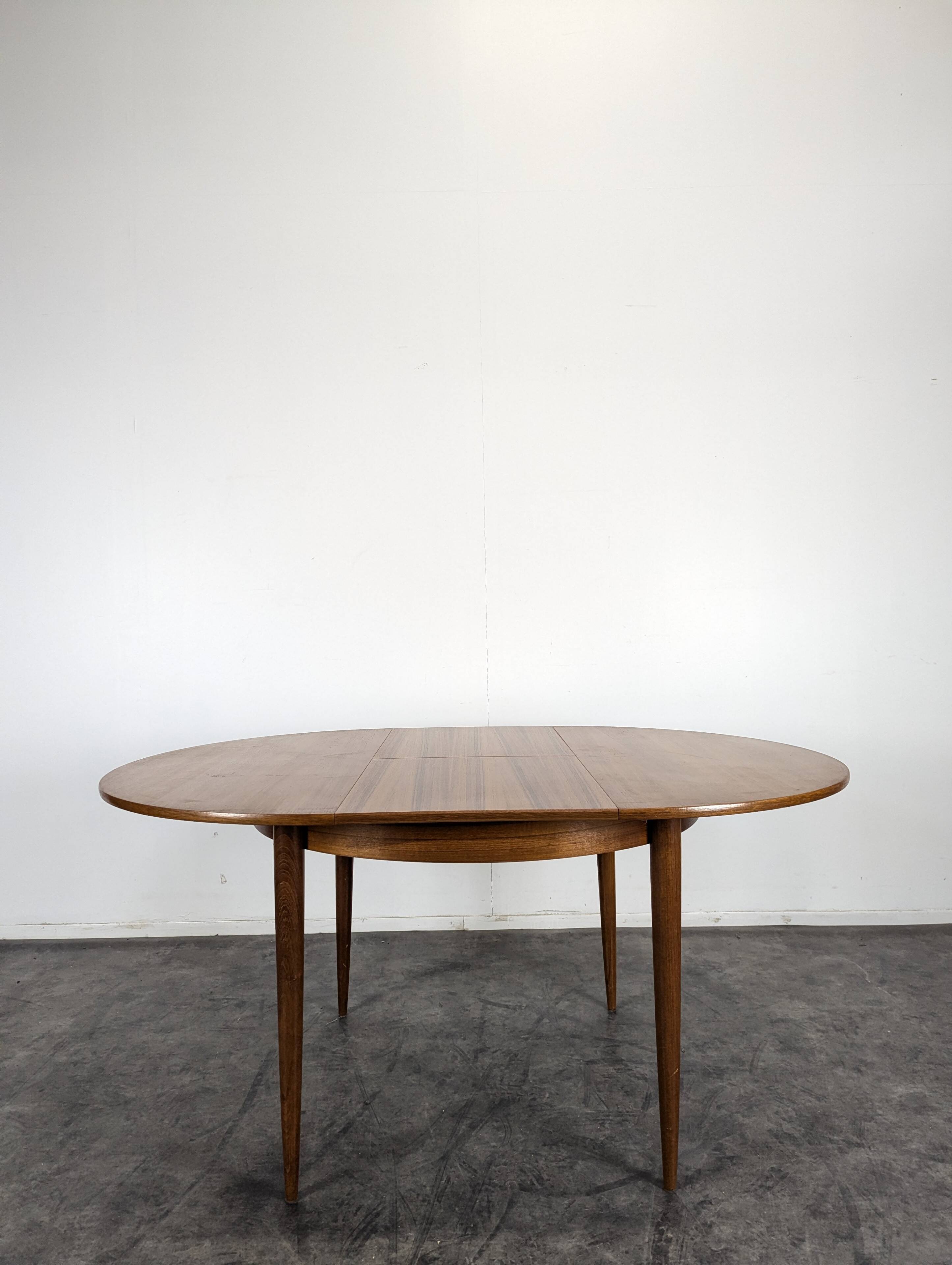 Scandinavian teak table with extension.