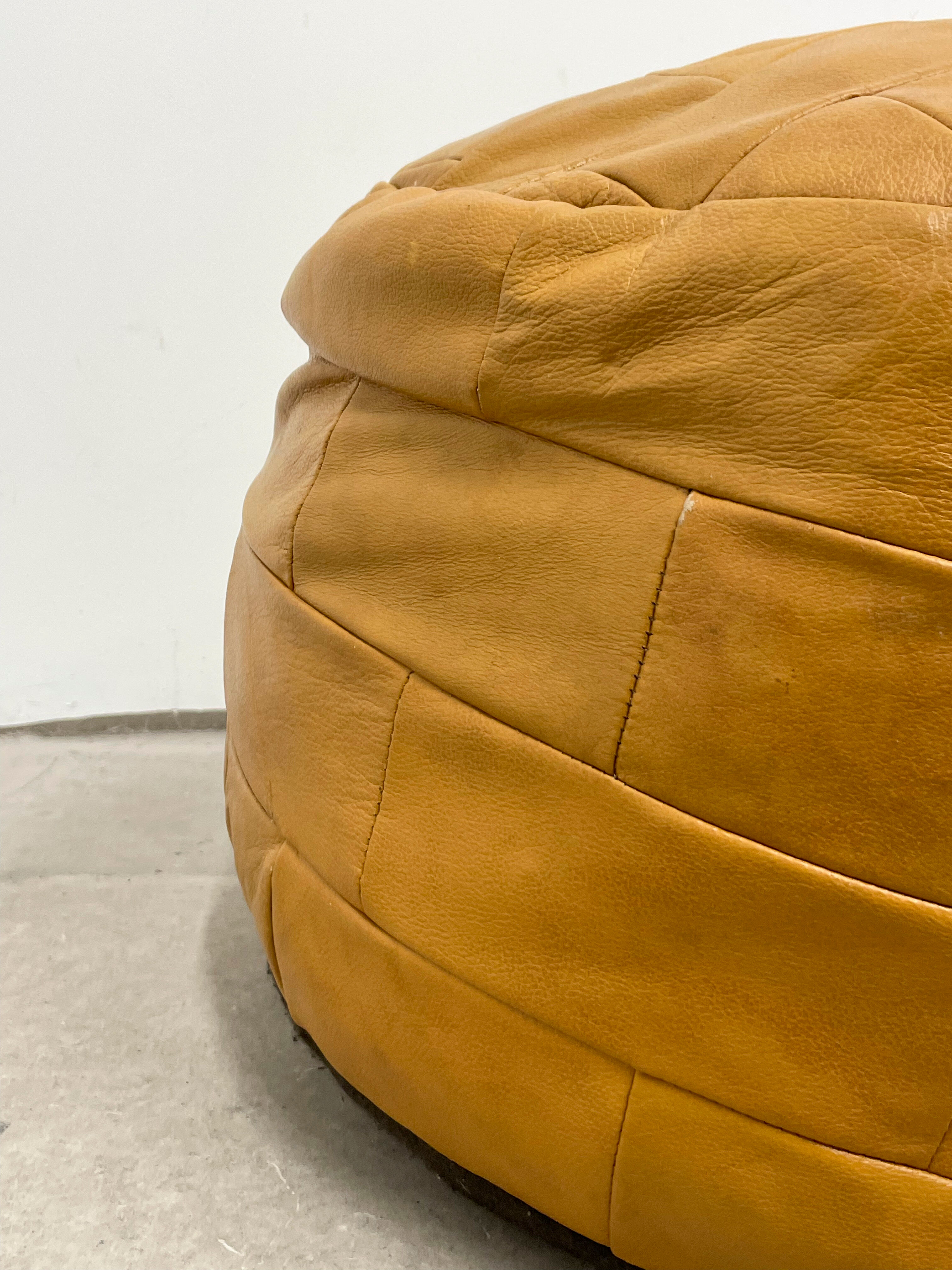 Ochre leather patchwork pouf