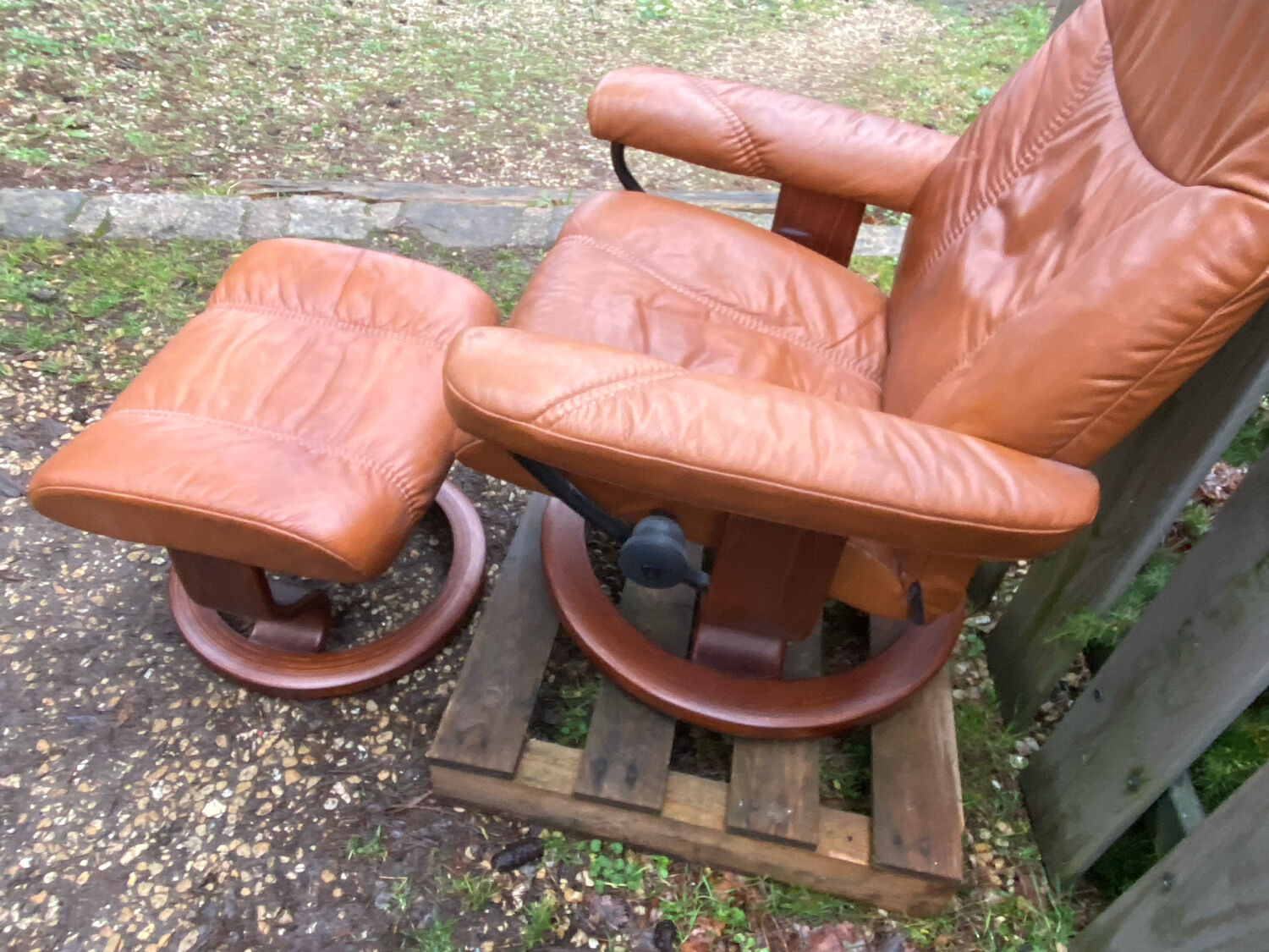 Stressless armchair and footrest set from the 70s/80s.
