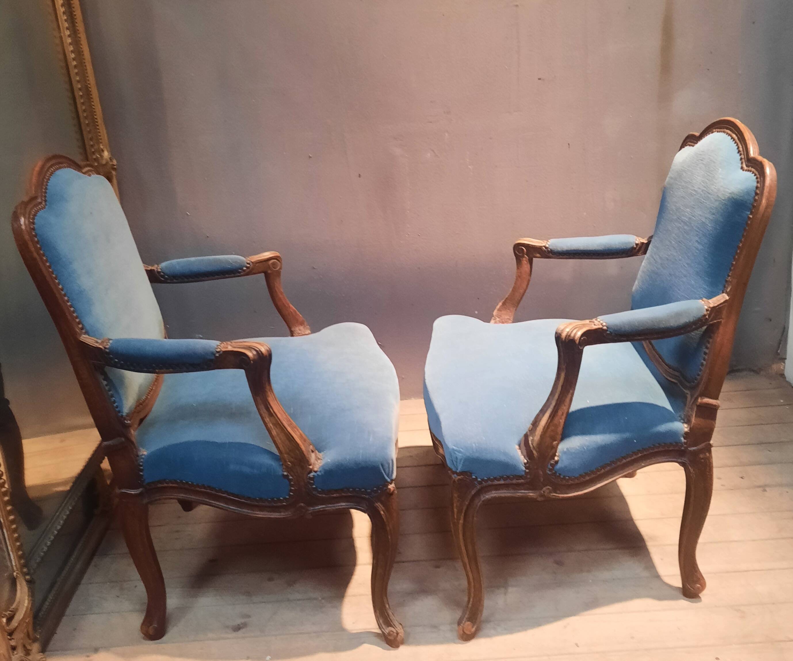 Pair of large armchairs in Louis XV style from the 19th century.