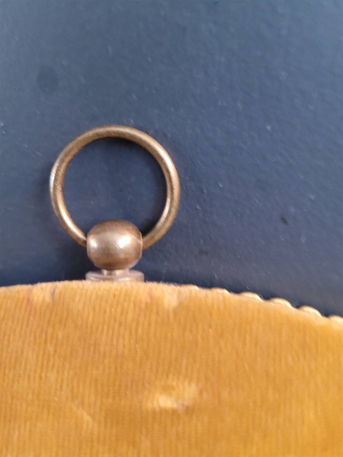 Vintage mirror with mustard velvet frame