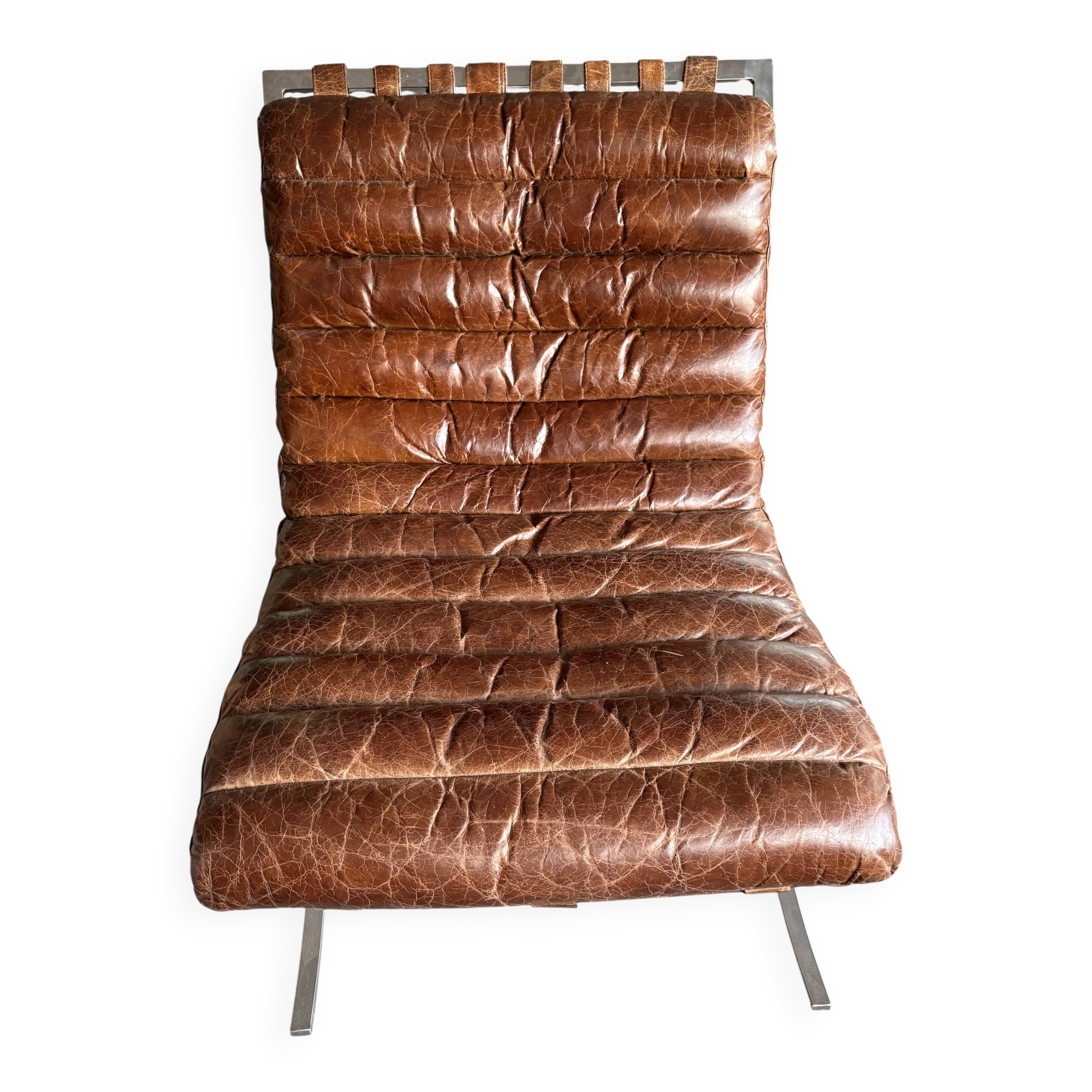 Pair of brown leather armchairs