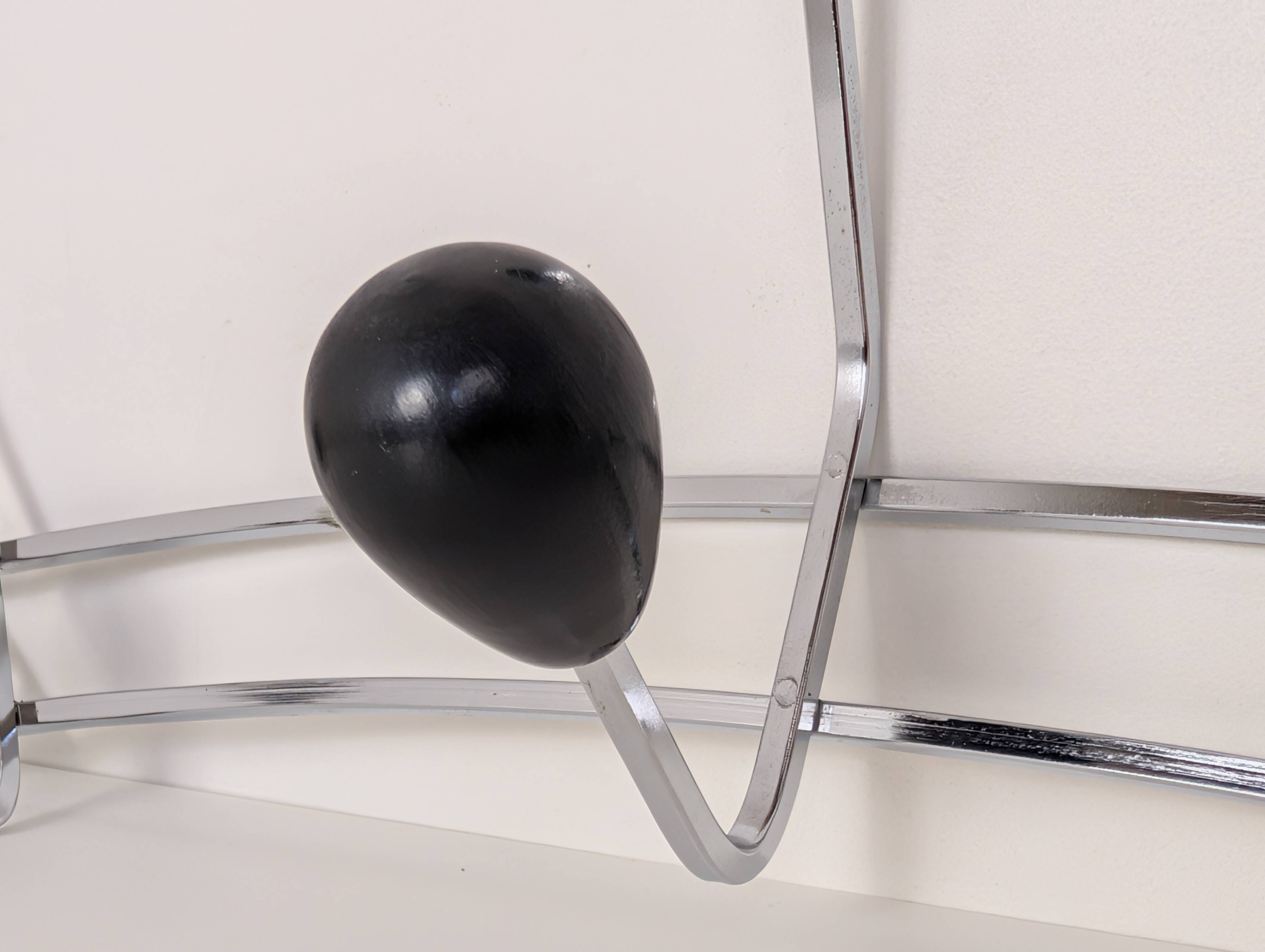 Chrome wall-mounted coat rack