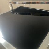 Pair of nesting tables in chromed metal and glass