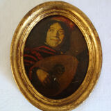 Set of 2 paintings in oval frames