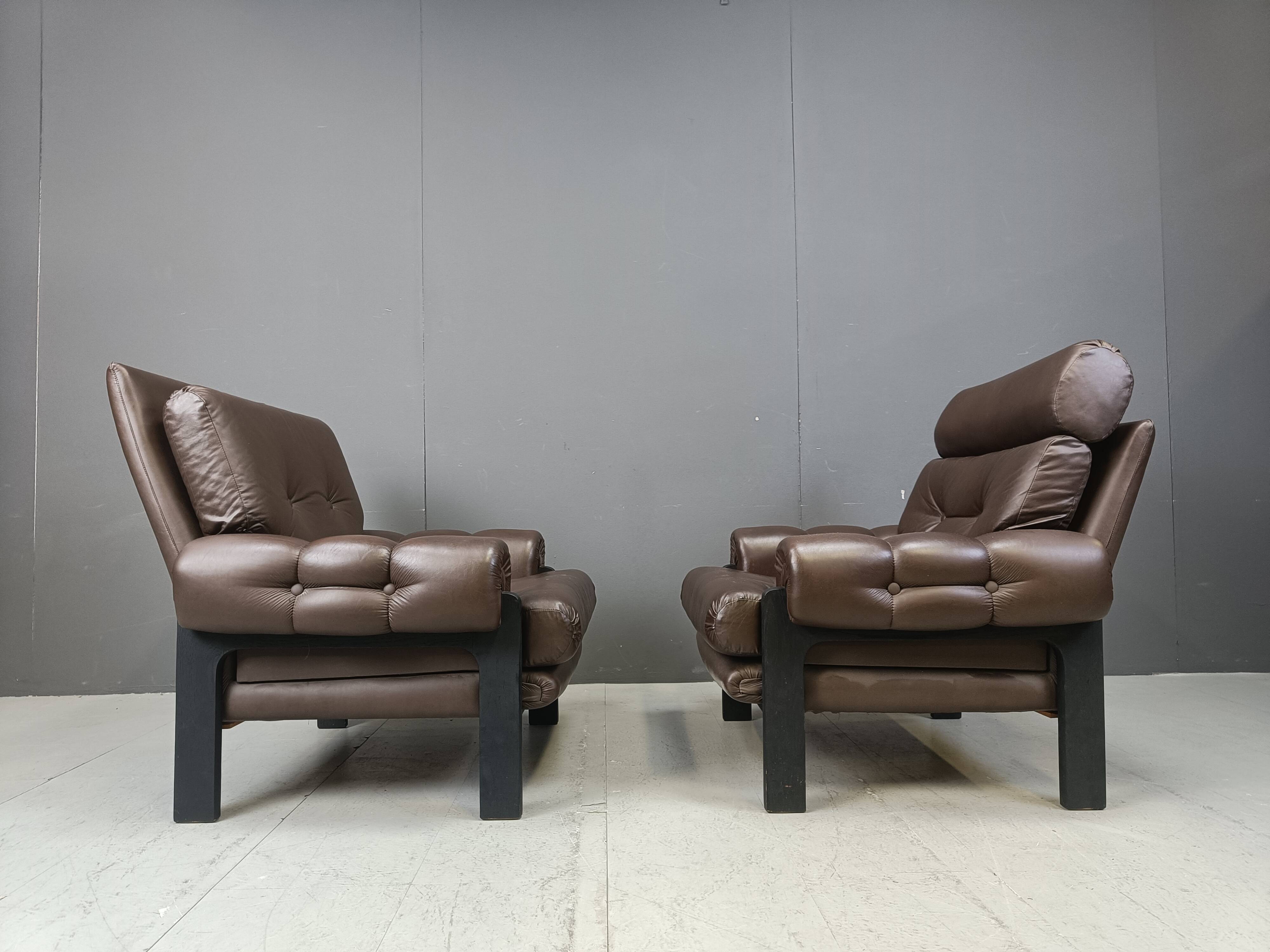 Pair of leather armchairs made in Denmark, 1960s