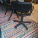 Two black leather armchairs