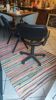 Two black leather armchairs