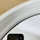 Space age mirror with white frame from the 1970s.