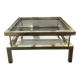 Vintage 1970s coffee table brass chrome Maison Jansen style with a top cover.