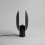 Black, oxidized aluminum table lamp, contemporary work.
