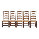 4 or 5 solid wood chairs with light oak straw and high backs