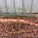 Suite of 3 trundle tables in golden brinze and glass slabs period 1970/1980