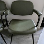 Pair of khaki green metal and skai armchairs from the 1960s