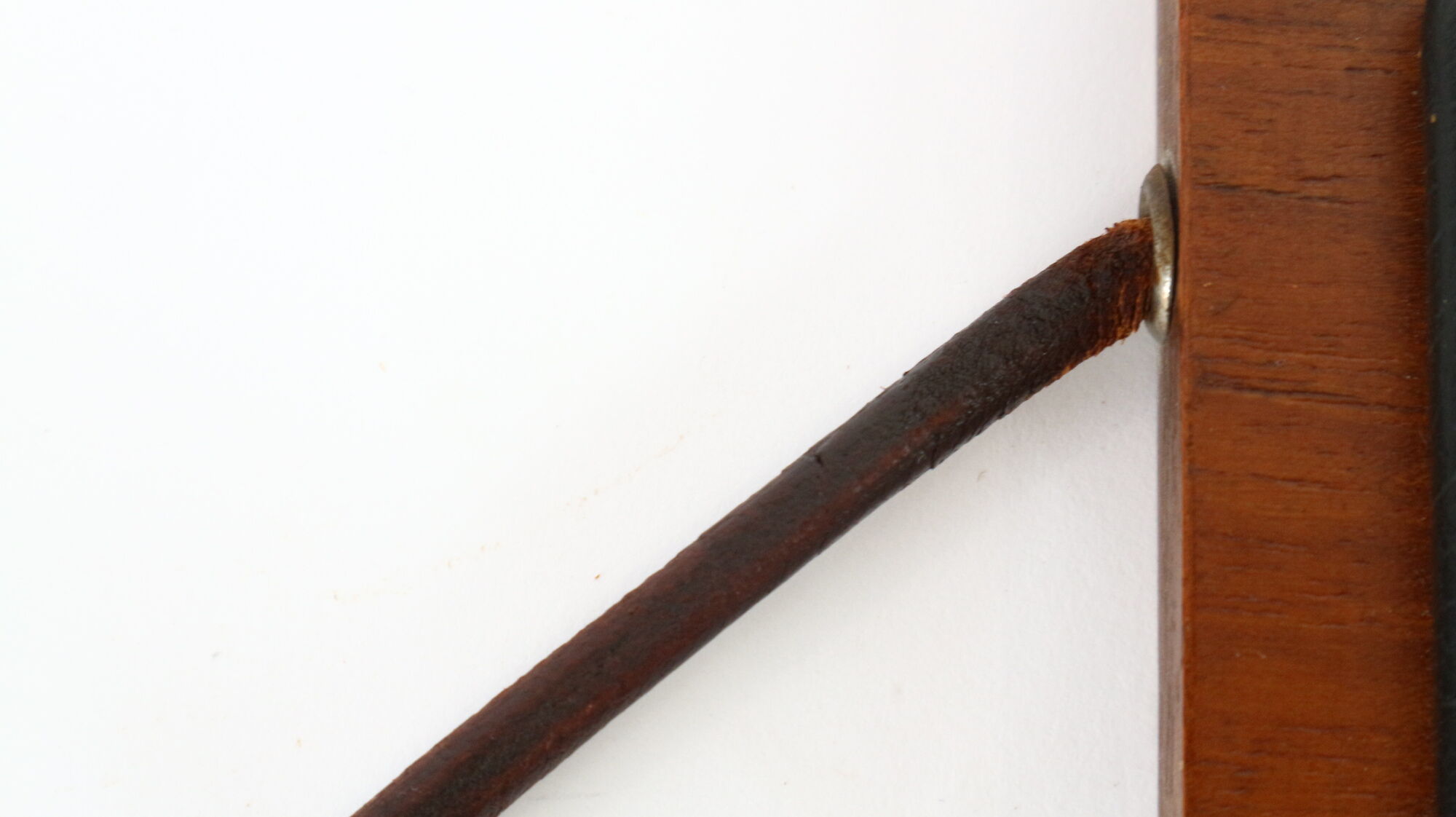Two coat hangers, wood, leather and black leather, 70s