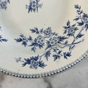 Hollow plate in ironstone from Terre de Feu of Grigny with floral decoration bl