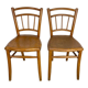 Pair of curved wood bistro chairs and studded and perforated seat