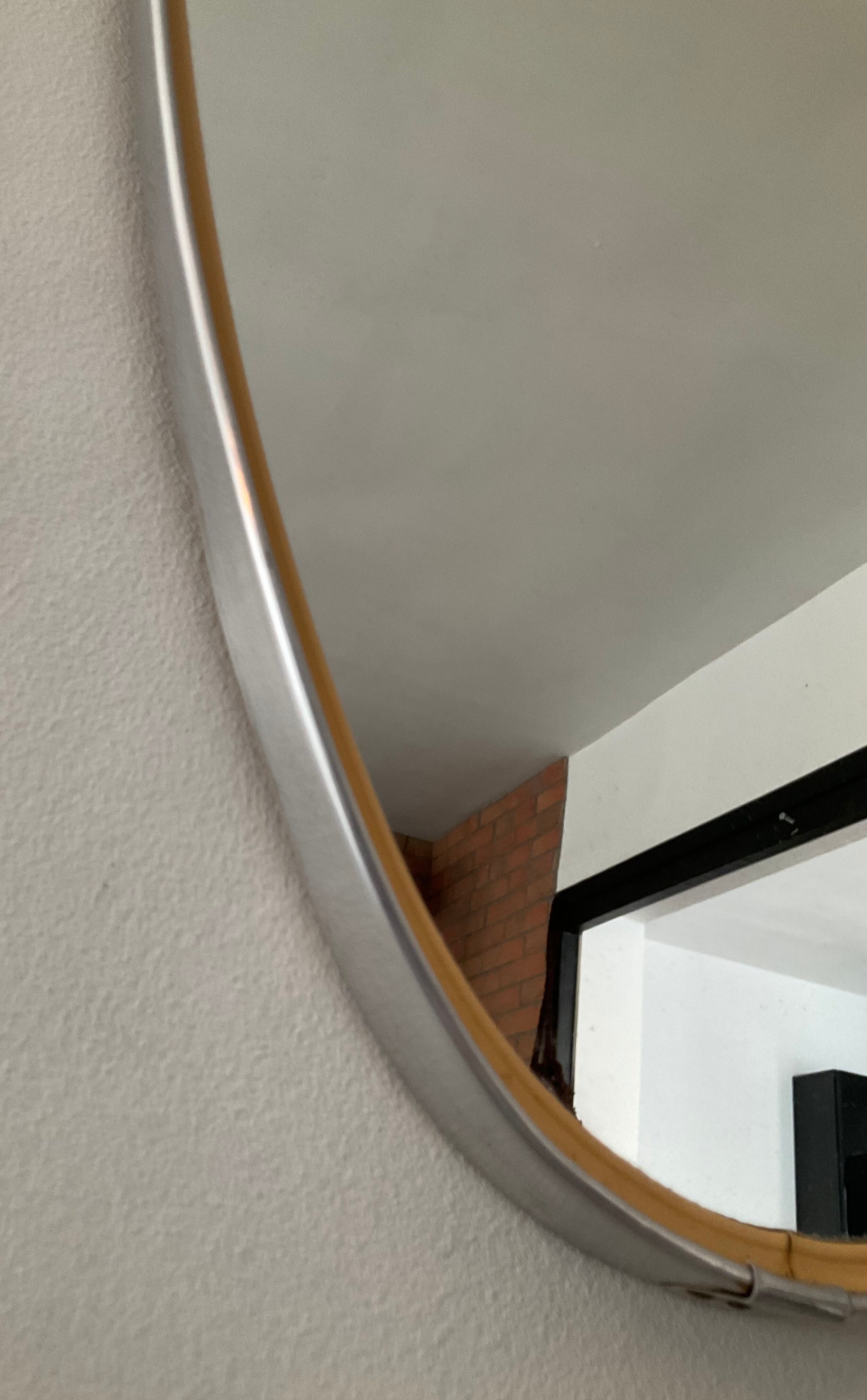 Asymmetrical mirror Deknudt from the 60s