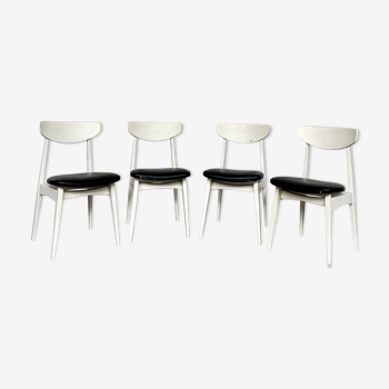 Series of 4 white and black Scandinavian chairs Ingrid from Stella 1960.