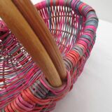 Small multi-colored wicker basket for children
