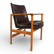 Fröscher leather armchair by Ib Kofod-Larsen, 1960