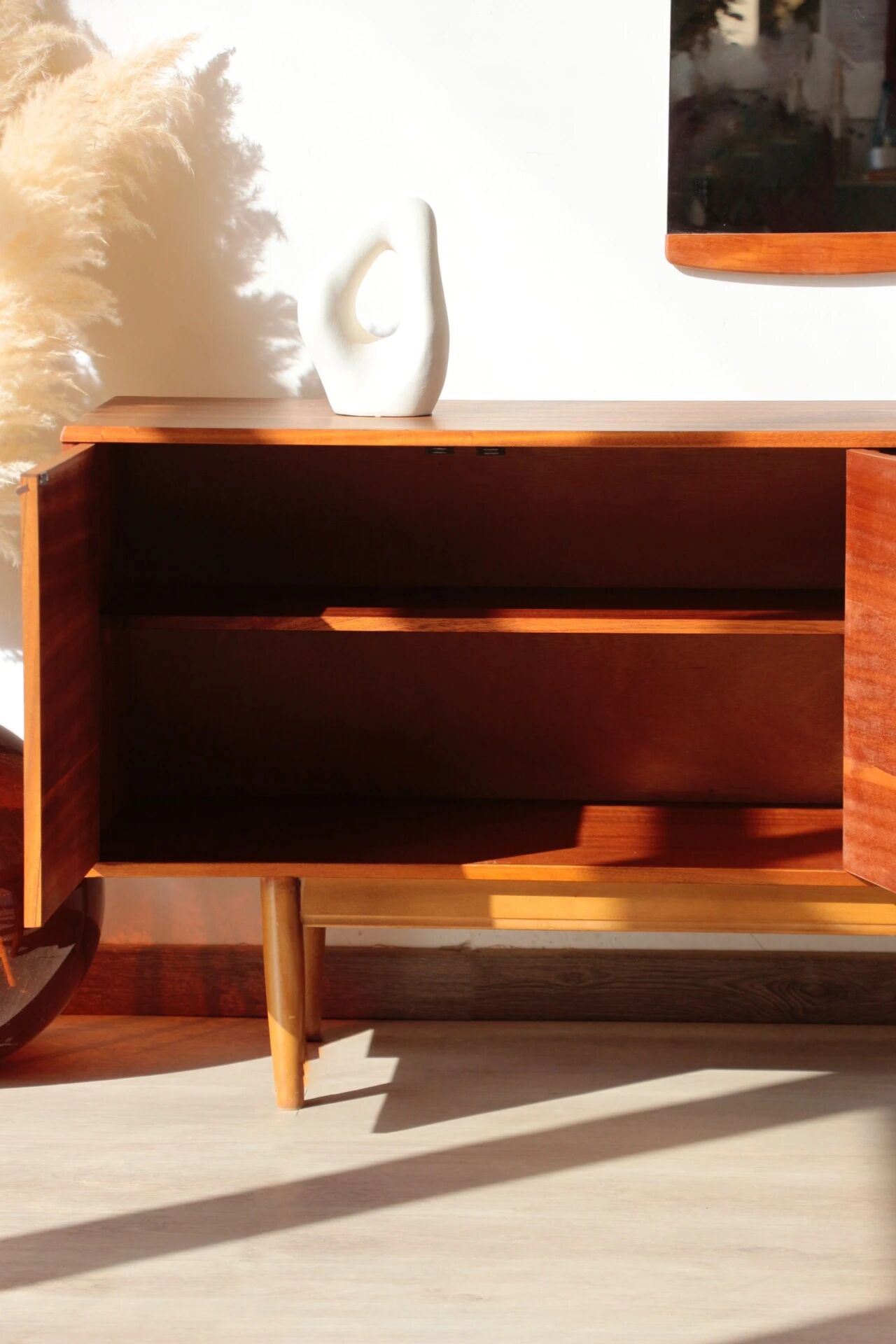 Vintage zebrano and walnut furniture from Morris of Glasgow.