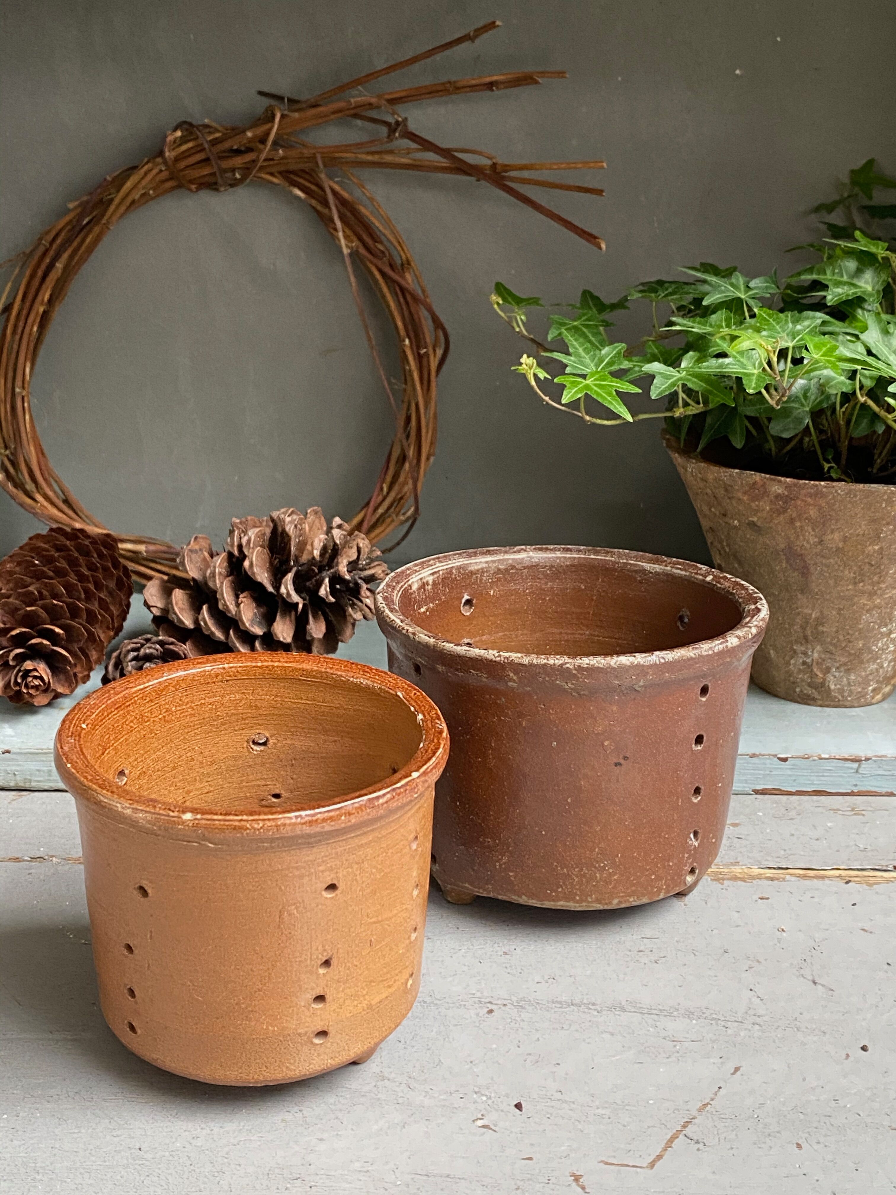 Pair of old faisselle molds