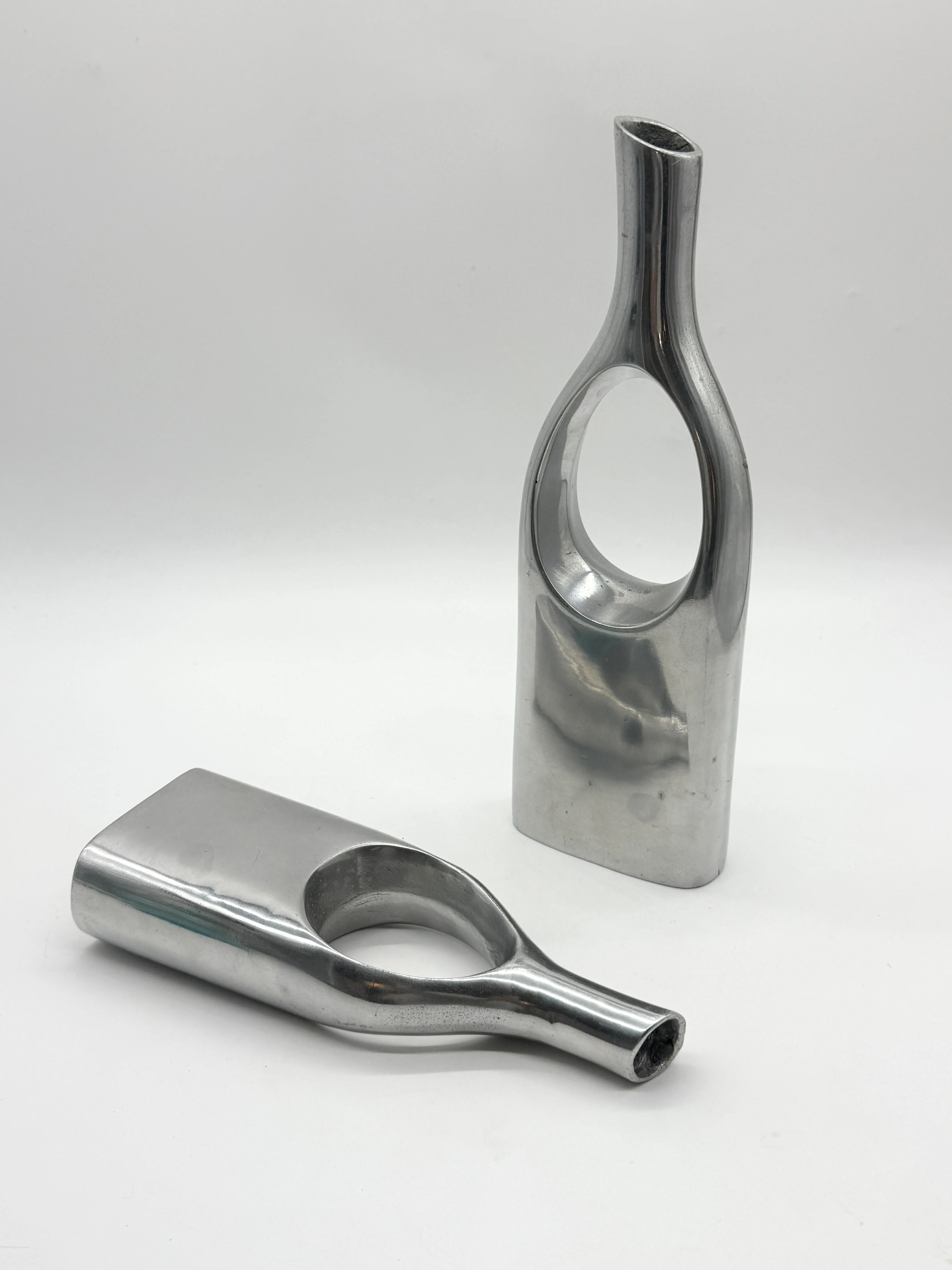 Pair of "drop" vases in aluminium cast, Italy, 1970s