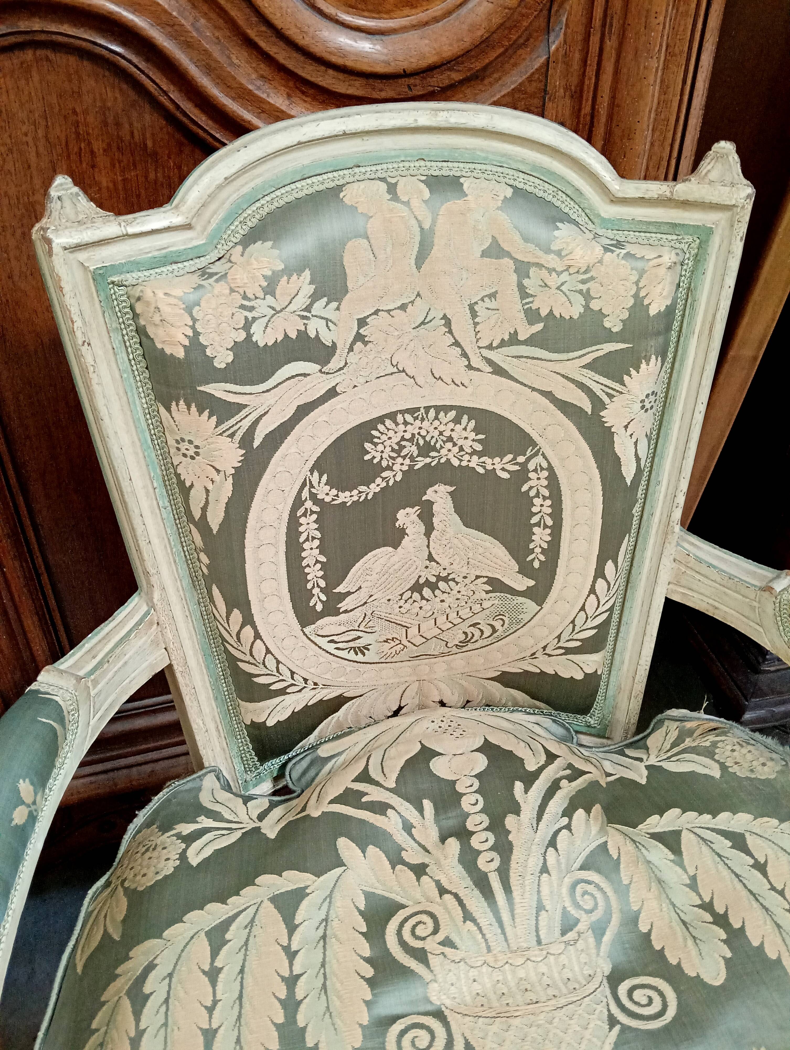 Pair of large Louis XVI armchairs in water green and cream wood.