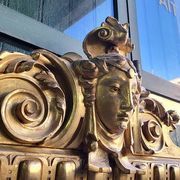 LARGE GOLDEN BEVELLED MIRROR WITH HEAD REF JE