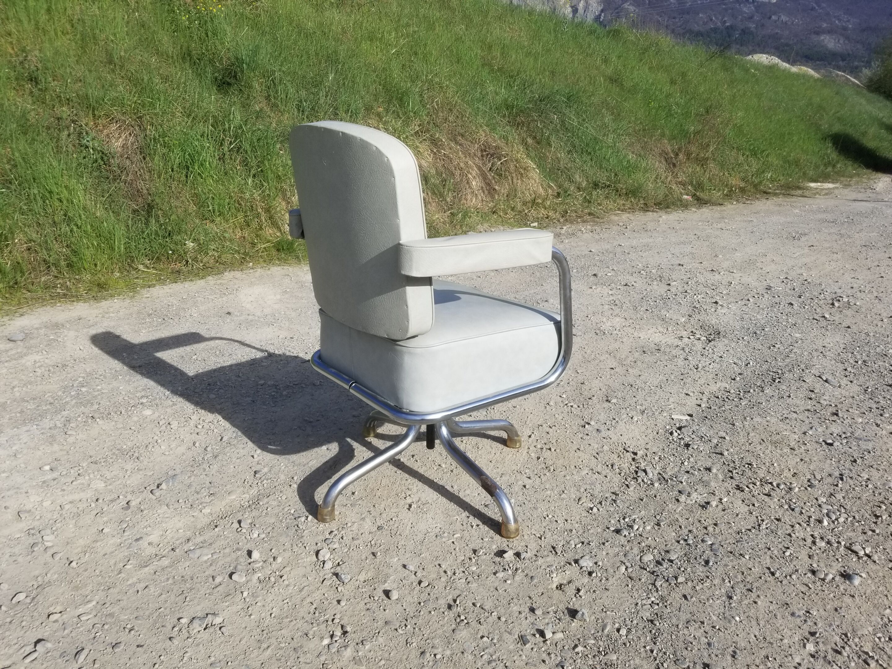 Old light grey pullman swivel office chair