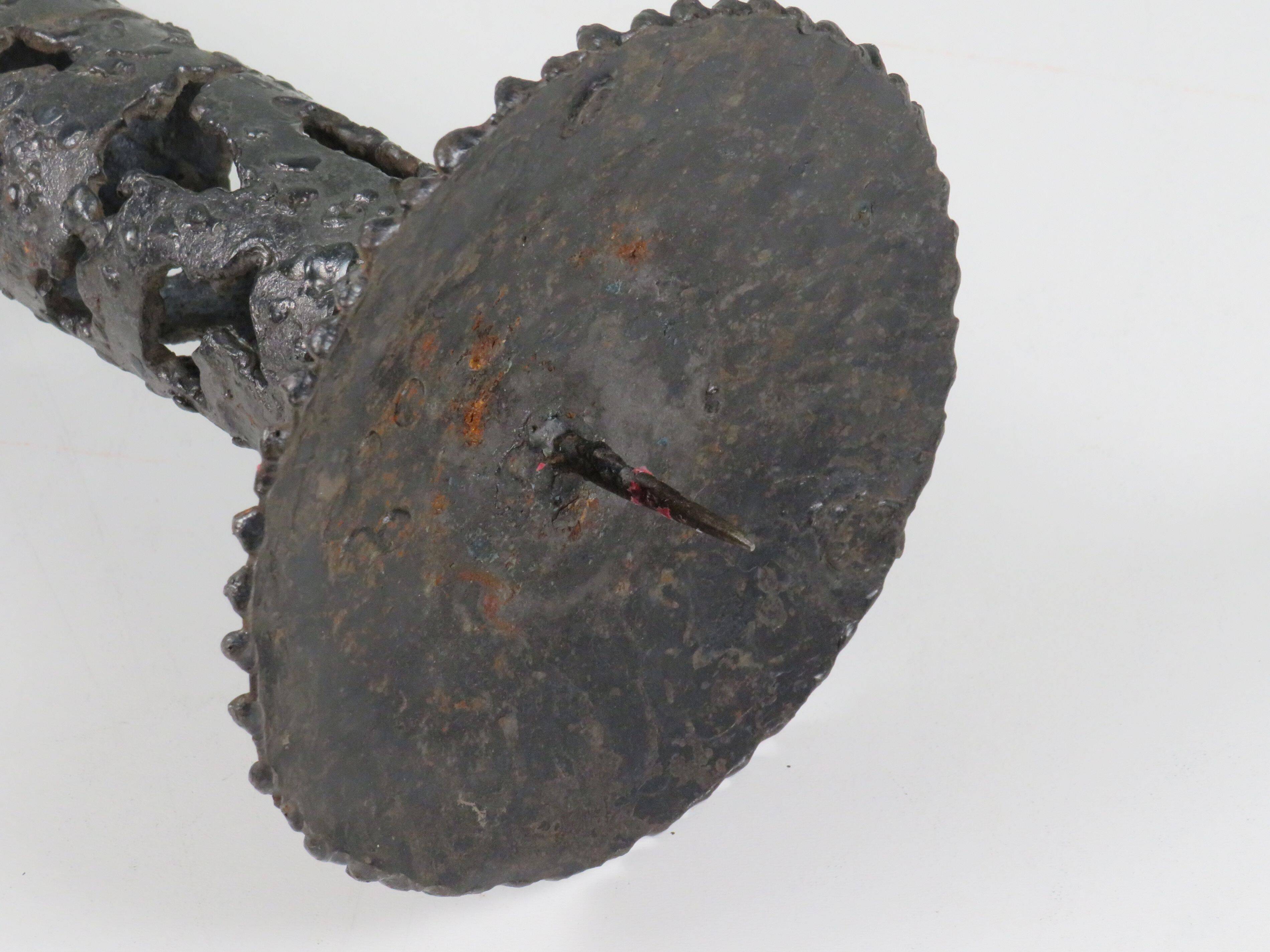 Brutalist wrought iron candlestick, European craftsmanship, 1960s