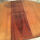 Scandinavian round table in rosewood veneer