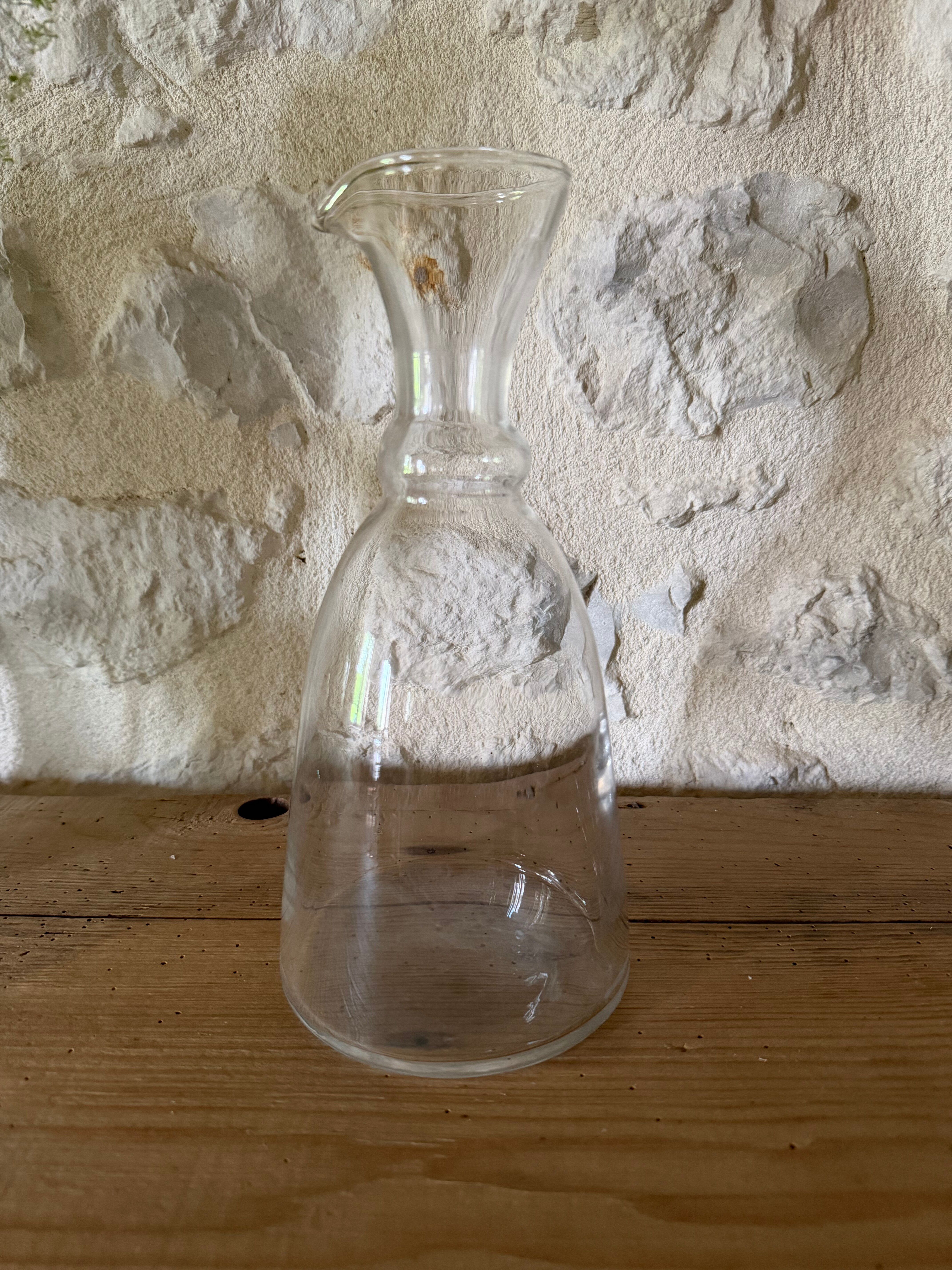 Antique glass pouring jug