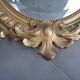 Antique mirror in wood and gilded stucco