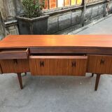 Curved teak enfilade from the 1960s in London.