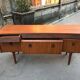 Curved teak enfilade from the 1960s in London.