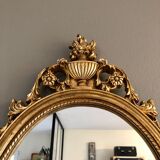 Oval gilded mirror baroque style