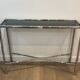 Console and chrome faux-bamboo mirror