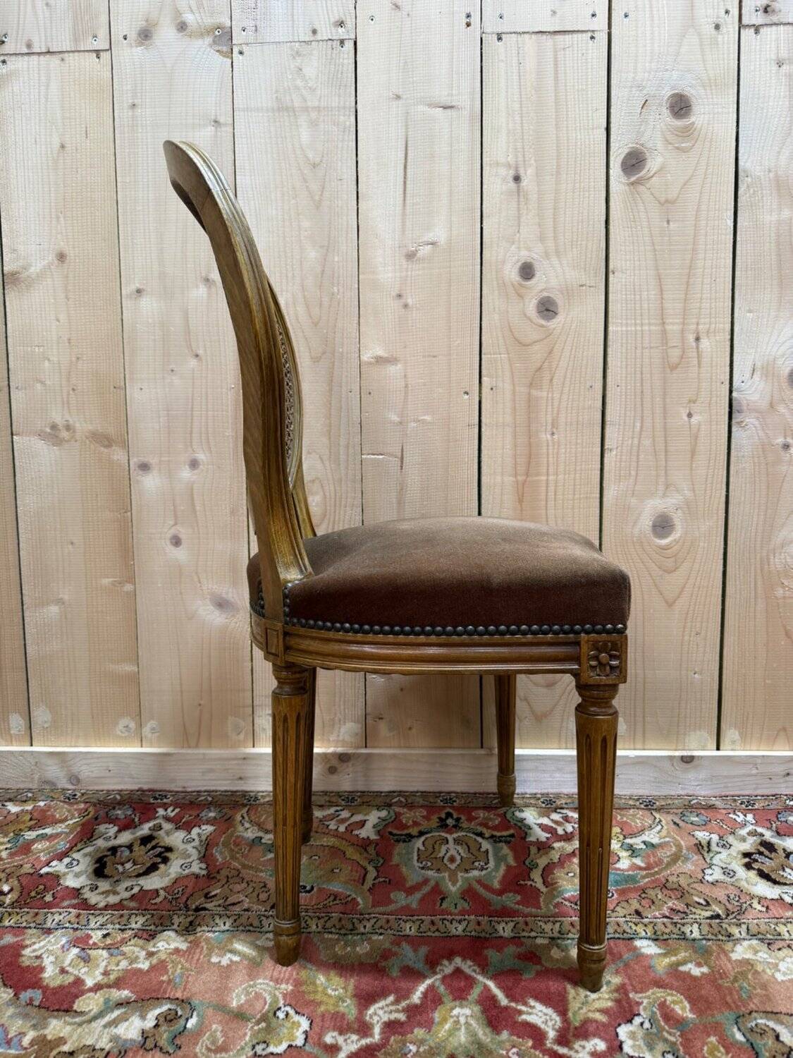 Set of 6 Louis XVI medallion chairs in wood and caning.